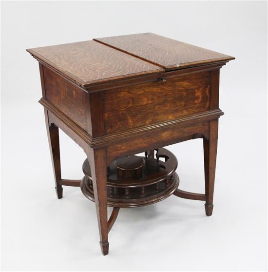 An Edwardian oak surprise table, with retailers label for Mappin & Webb, London, W.2ft .5in.